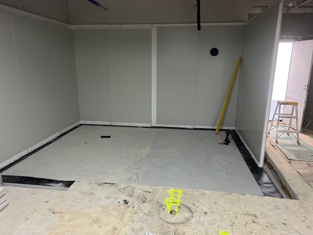 Floor Wet lining, insulation and wall panels installed, ready for the 240v thermostat controlled heated floor in the freezer room to be installed.